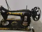 Sewing machine with wooden table, motor and foot