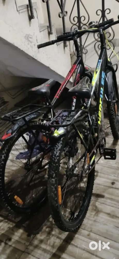 Two bicycles red and green colour