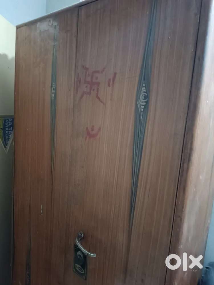 Selling almirah godrej and 3 table with Chairs