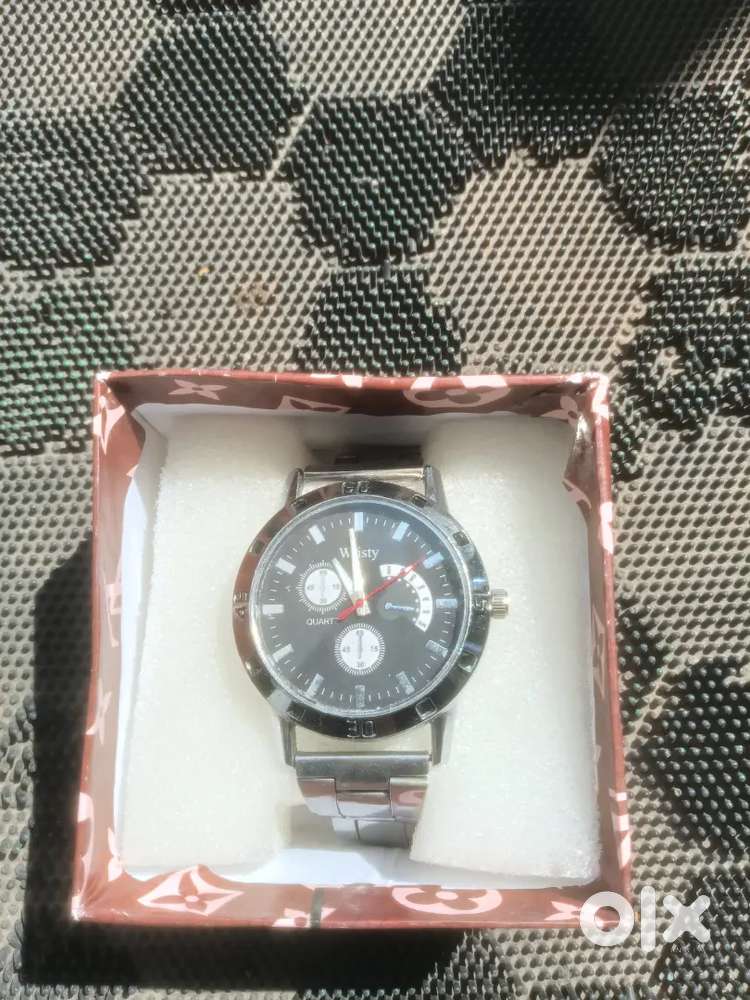 It is a silver watch of wristy company