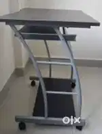 Computer table and rolling chair