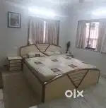 Double bed king size with side tables