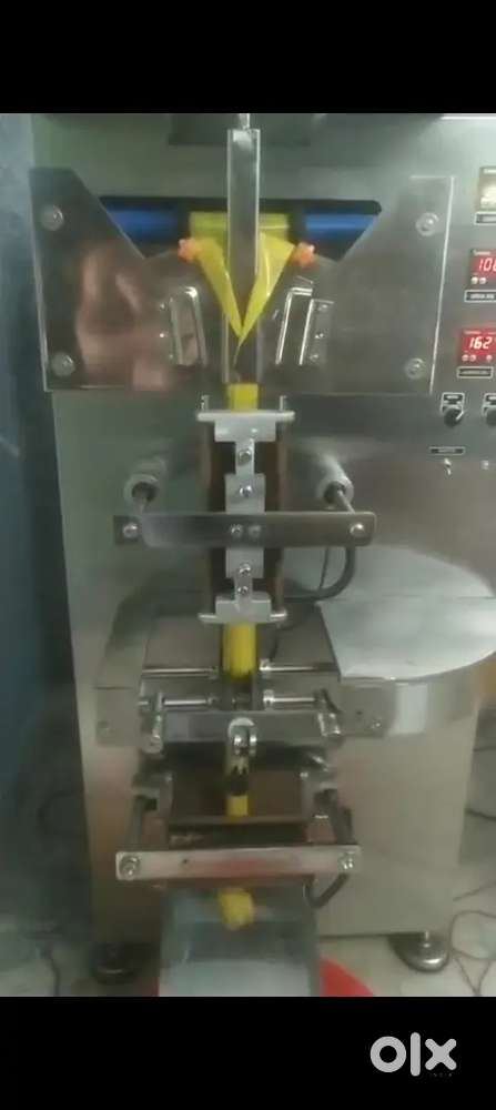 LIQUID PACKING MECHINE