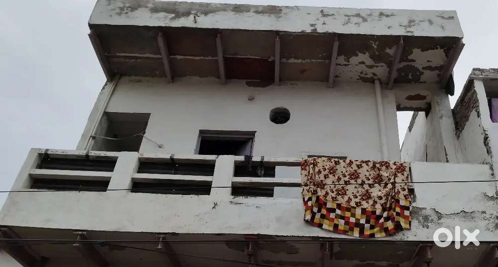 Two shops with 1 bhk house