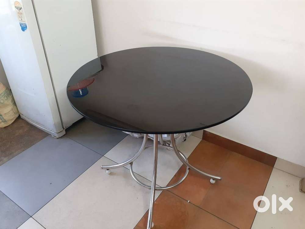 Glass top round dining table