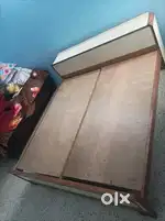 Double bed with standing box storage