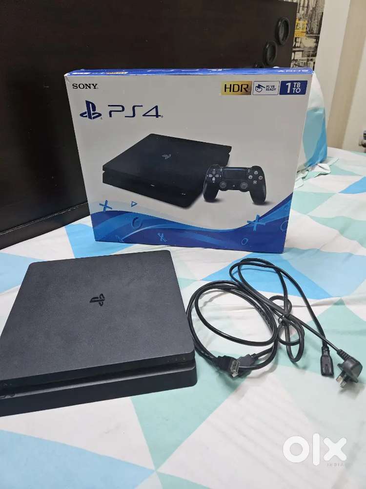 PS4 1TB in Excellent Condition  Original Box + Cables  No Controller