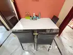 4 seater glass top dinning table