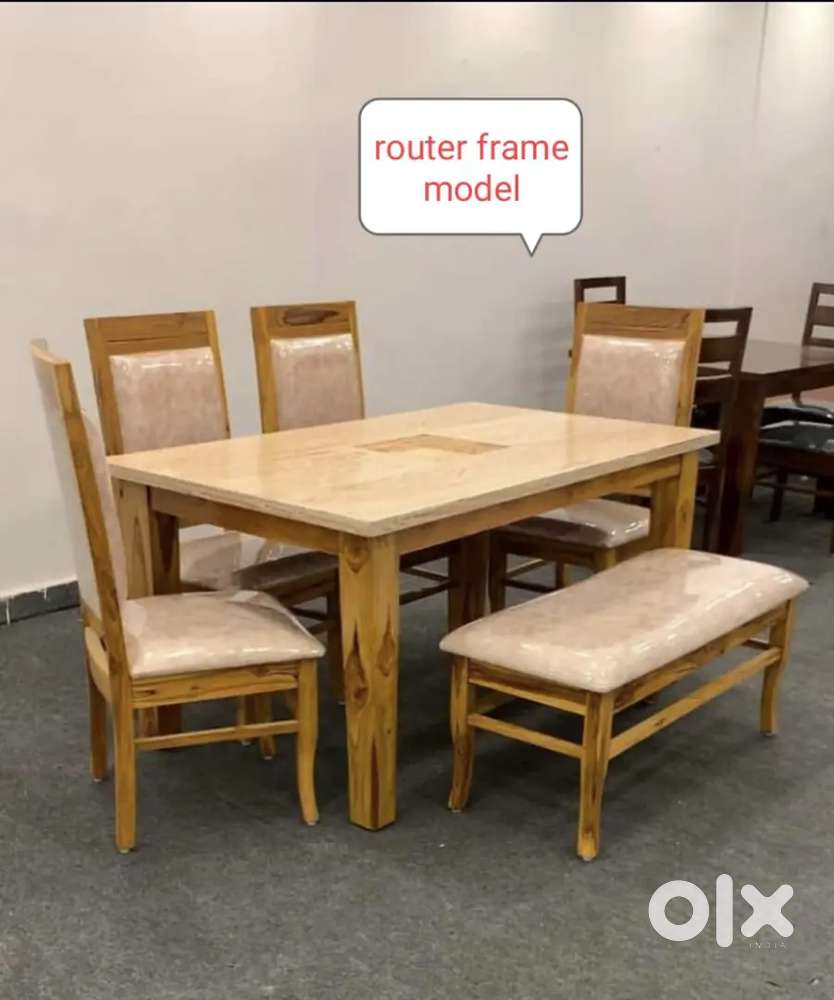 4 chair with 1 puffy and beautiful colour and designing table
