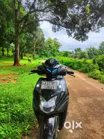 Honda Dio 125 Smart varient (2023) with added fog lights and flasher.