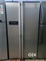 Lg 600 liter side by side with 1 year warranty on bill
