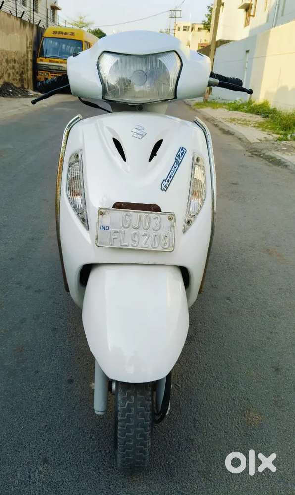 Mahadev bike rajkot 80 feet road Laxmiwadi main road opp anand bakery