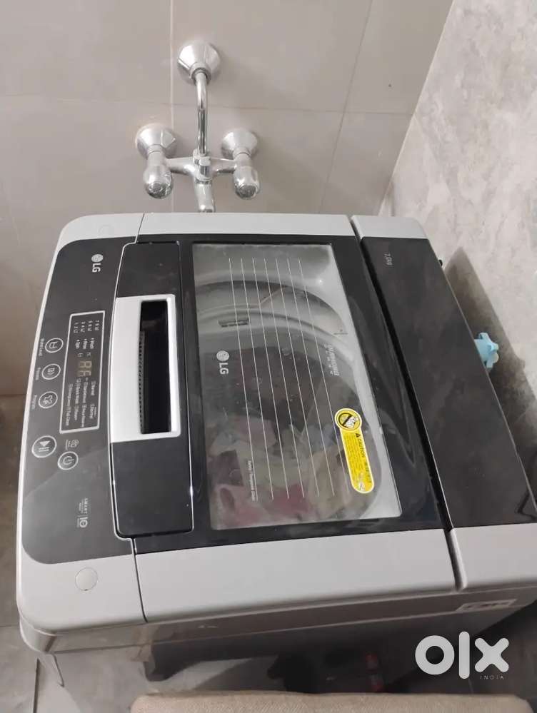 LG top load automatic washing machine capacity 7kg condition new