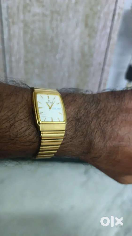 TITAN GOLD WATCH ORIGINAL.