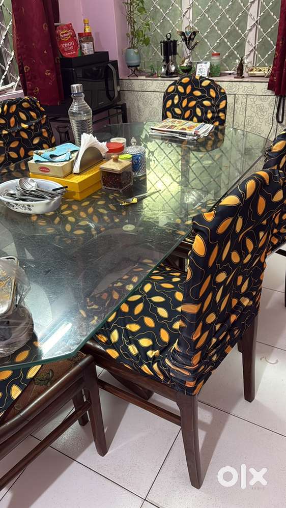 Dining table with glass top n 6 chairs