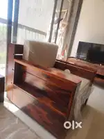 2 single seater wooden street sofa and wooden street centre table.