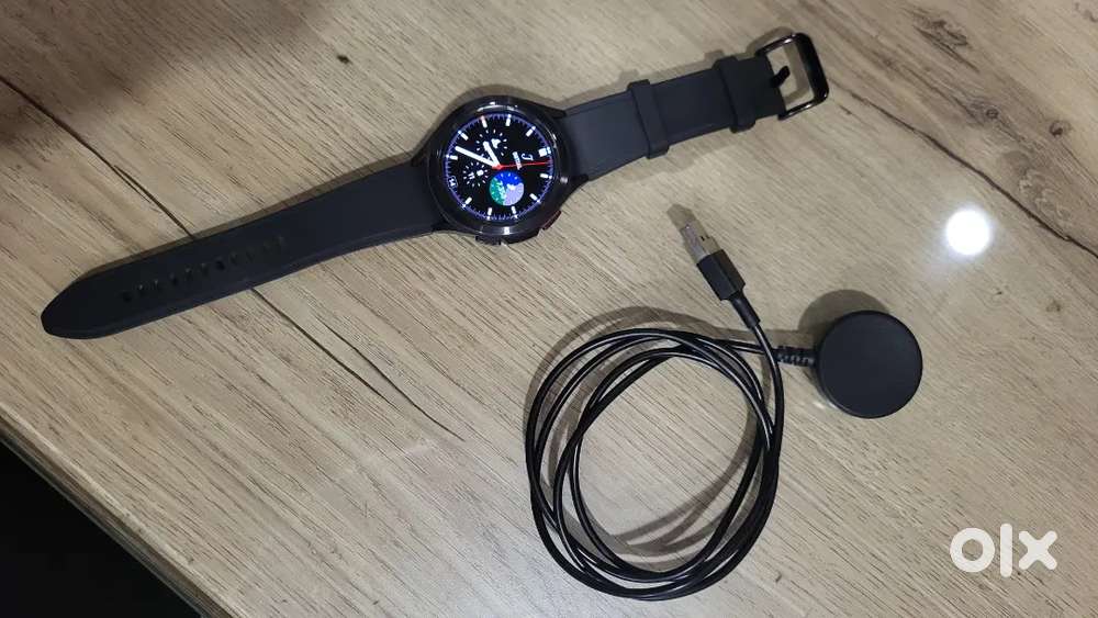 Samsung Galaxy Watch4 Classic with charger