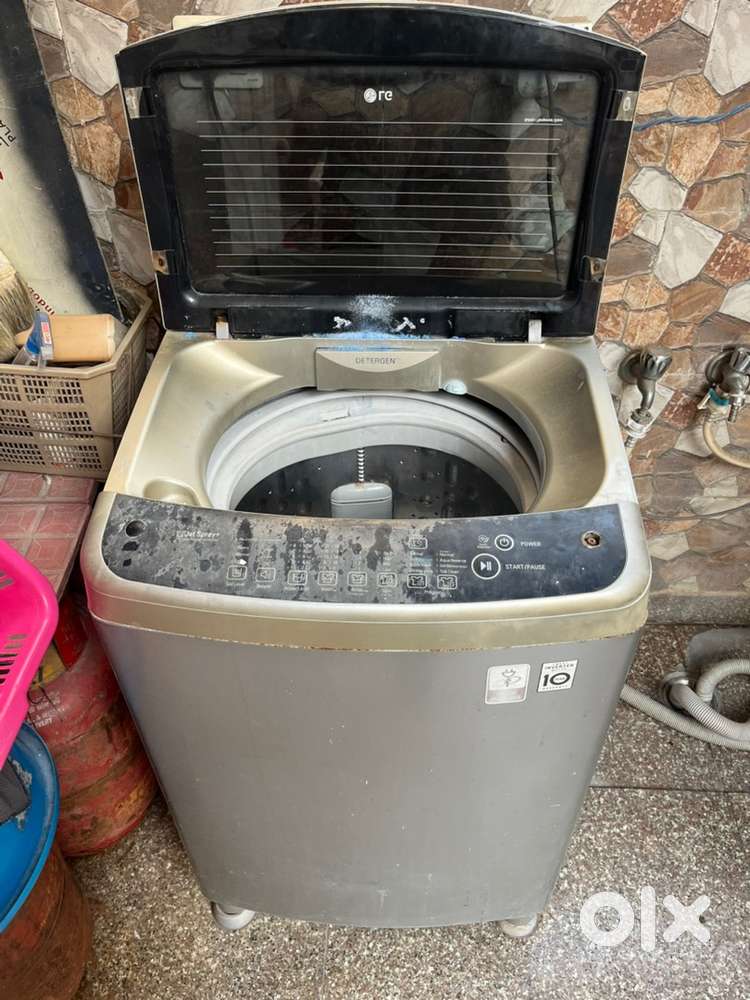 LG WASHING MACHINE TOP LOAD 9 KG