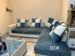 L shaped sofa set with large coffee table