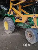 John Deere tractor and loader sharma machine