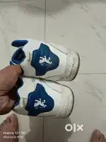 Sneakers and loafer shoes ,wrist watch of wrongn and titan , spectacle