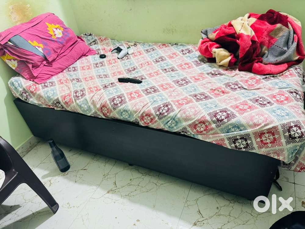 Brown box single bed