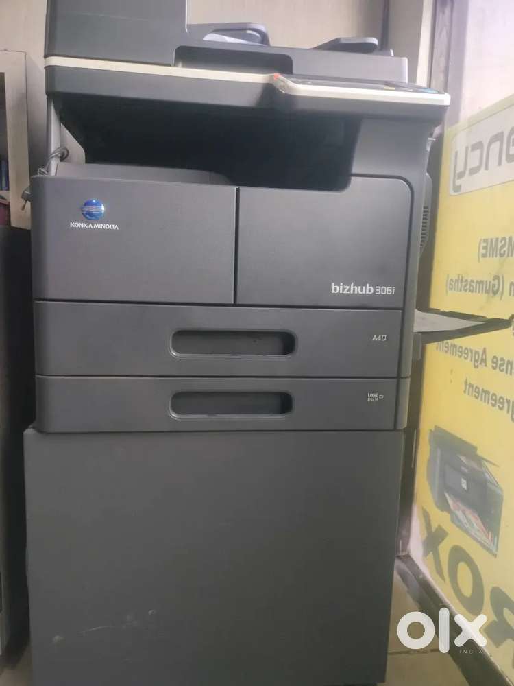 Konica Minolta  306i
