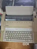 Electric typing machine new condition good performance