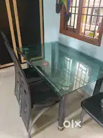 Glass top dining table with 3 chairs