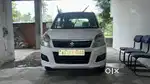 Maruti Suzuki Wagon R VXI. Year-2013, Petrol 67890 Km Driven.