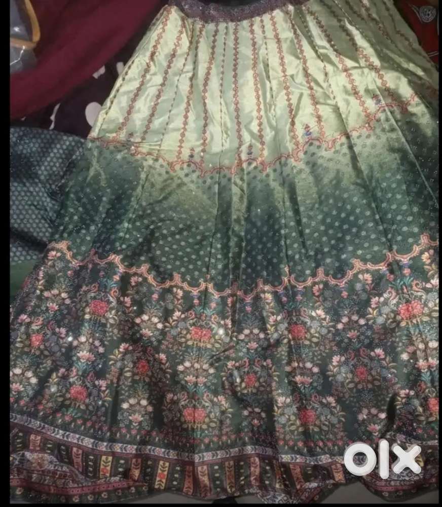 Green party wear lehenga for sale