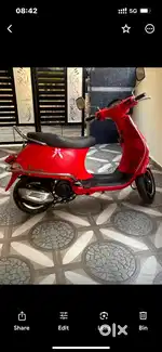 Red Vespa 125 model