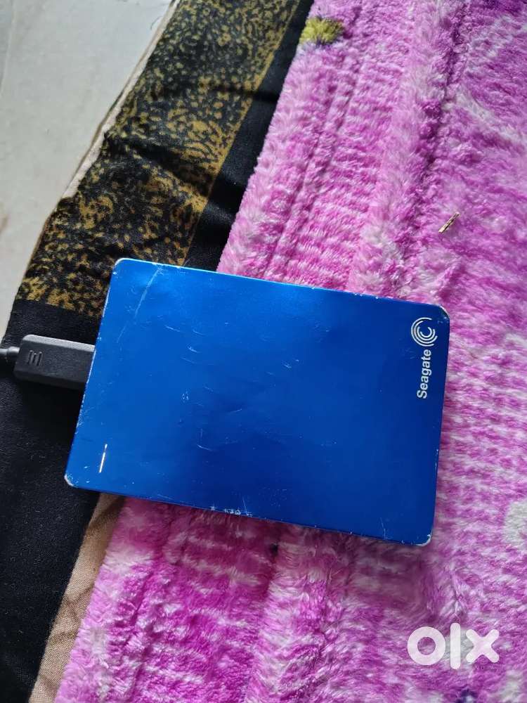 Seagate backup plus portable 1 TB Hard disk drive and 4GB Ram laptop