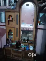 Dressing in which a mirror and small portion available  keeping thing