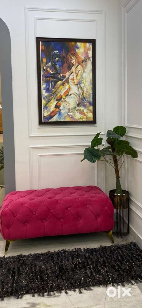 For sale pink couch painting and plant