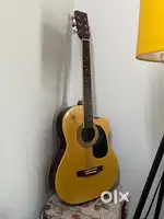 Acoustic guitar natural wood finish