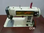 Sewing machine and carrom board