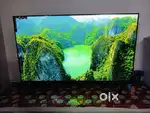 Brand new 48 inch smart Android ultra hd O led tv with sound bar Alexa