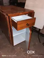 Folding dining table