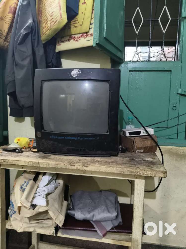 Tv with dish and table