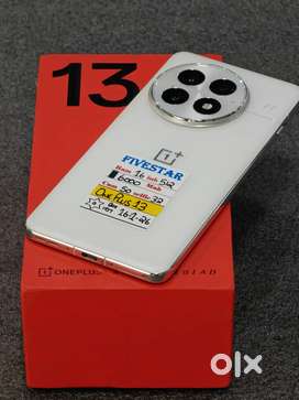 One plus 13 16/512gb 9 months warranty left fresh condition wit boxkit