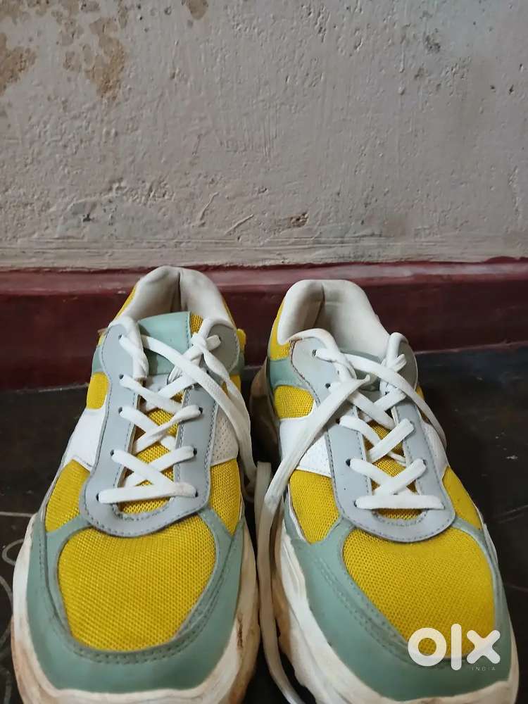 Neon and white colour shoes