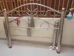 A brand new steel bed and Wood alna