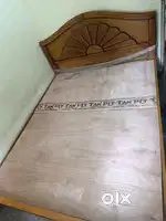 Wooden bed with two mattress