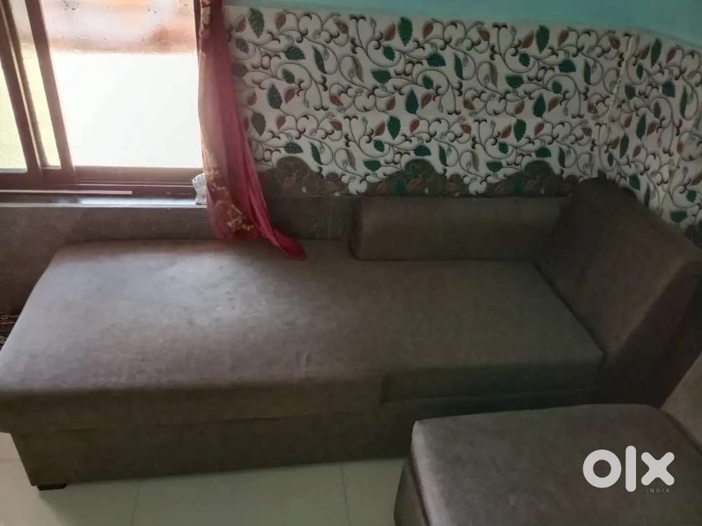 wooden bed with two pellow