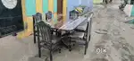 6 chair dining table with walnut polish available in Starf Furniture