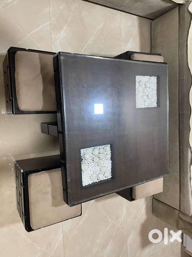 Center table with sitting and sofa cum bed