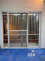 CPVC Sliding Door with Toughened Glass & Mesh – 8.5 x 8 ft (For Sale)