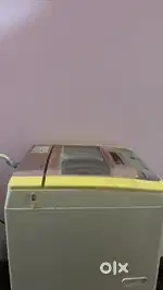 Washing machine toploaded