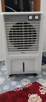 Mini Cooler for sale 1 month old in warranty running condition.